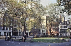 In 1983 on one of our visits in London we walked around the center and had a first look for me at least at Soho. Here is John sitting on a park bench in Soho Square.