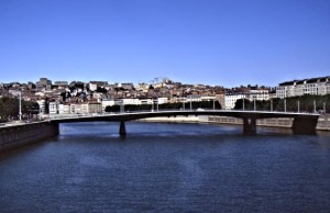 A walking bridge that crosses the Saône
