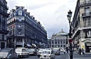 La rue Royale that goes from Place de la Concorde to l'Eglise de la Madeleine in its gigantic Greek style (in the background). Very old cars!